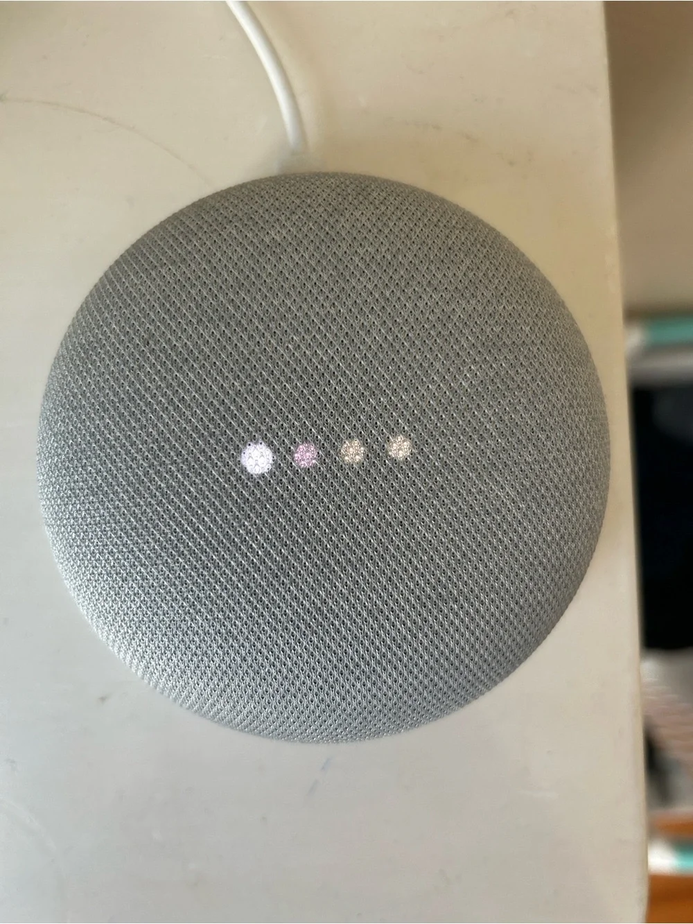 Google Nest Mini Smart Speaker in Light Gray and White